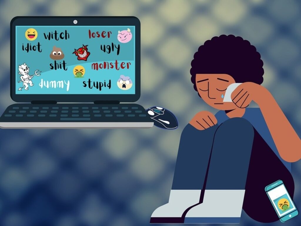 Ciberacoso: Ilustración muestra a una persona sufriendo por el acoso en Internet.
