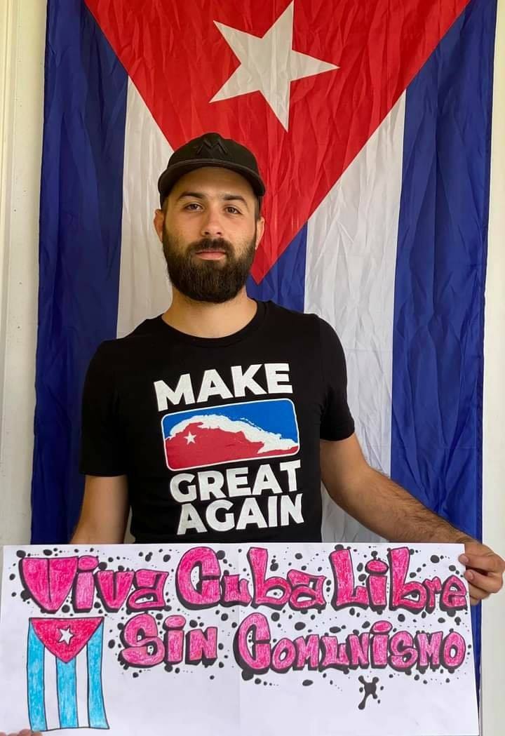 Cubanos sumándose a la iniciativa "Mi cartel por el cambio en Cuba"